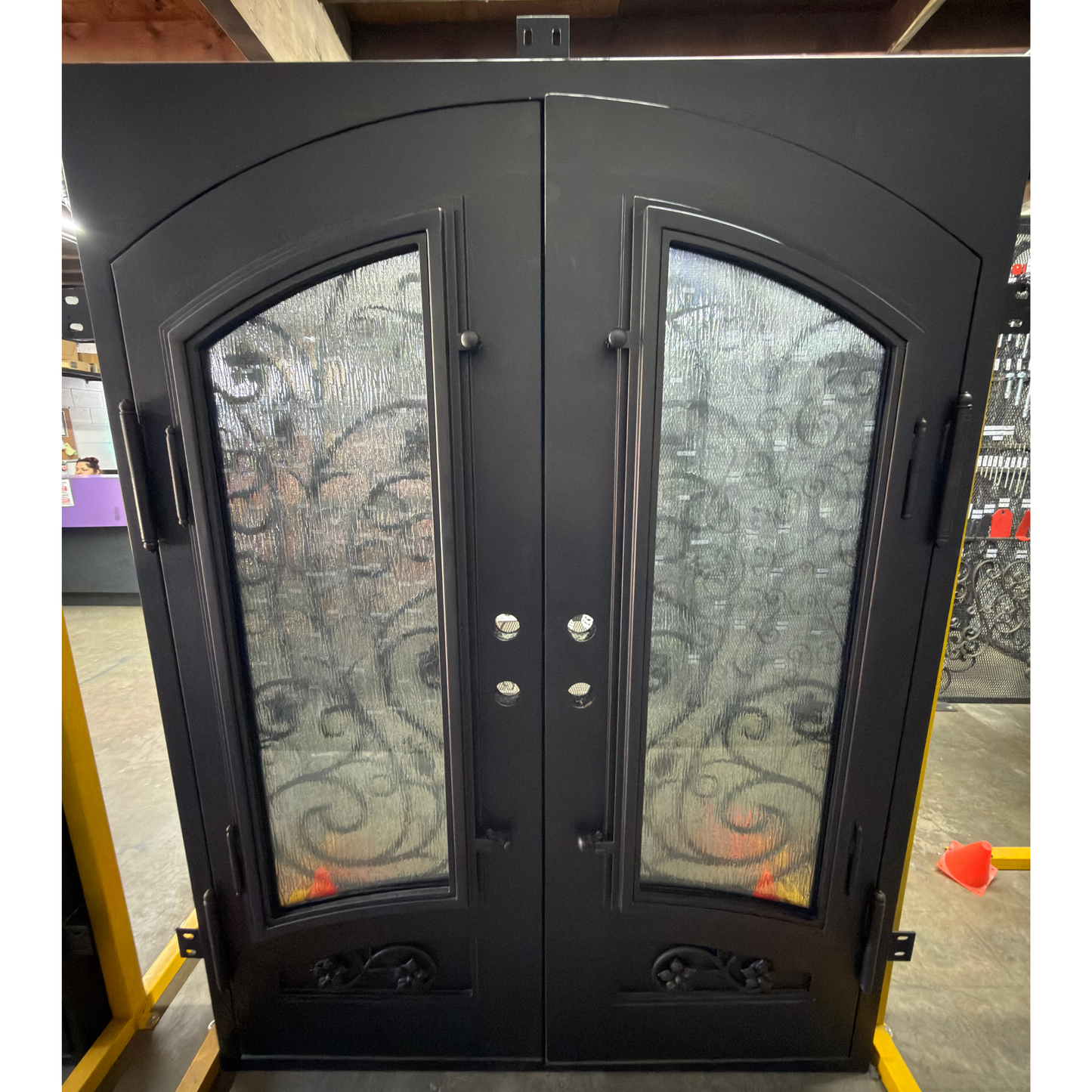 Decorative glass door with intricate patterns in a room setting