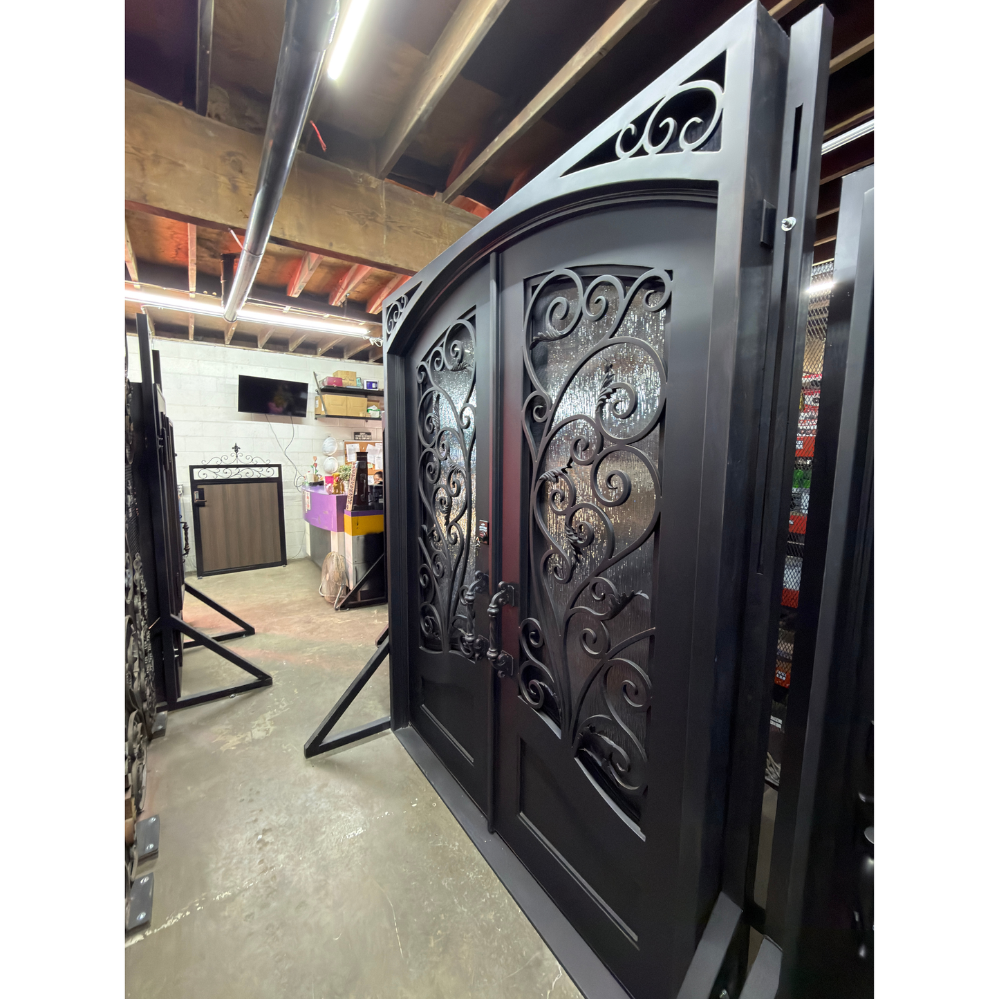 Decorative metal gate in a workshop setting