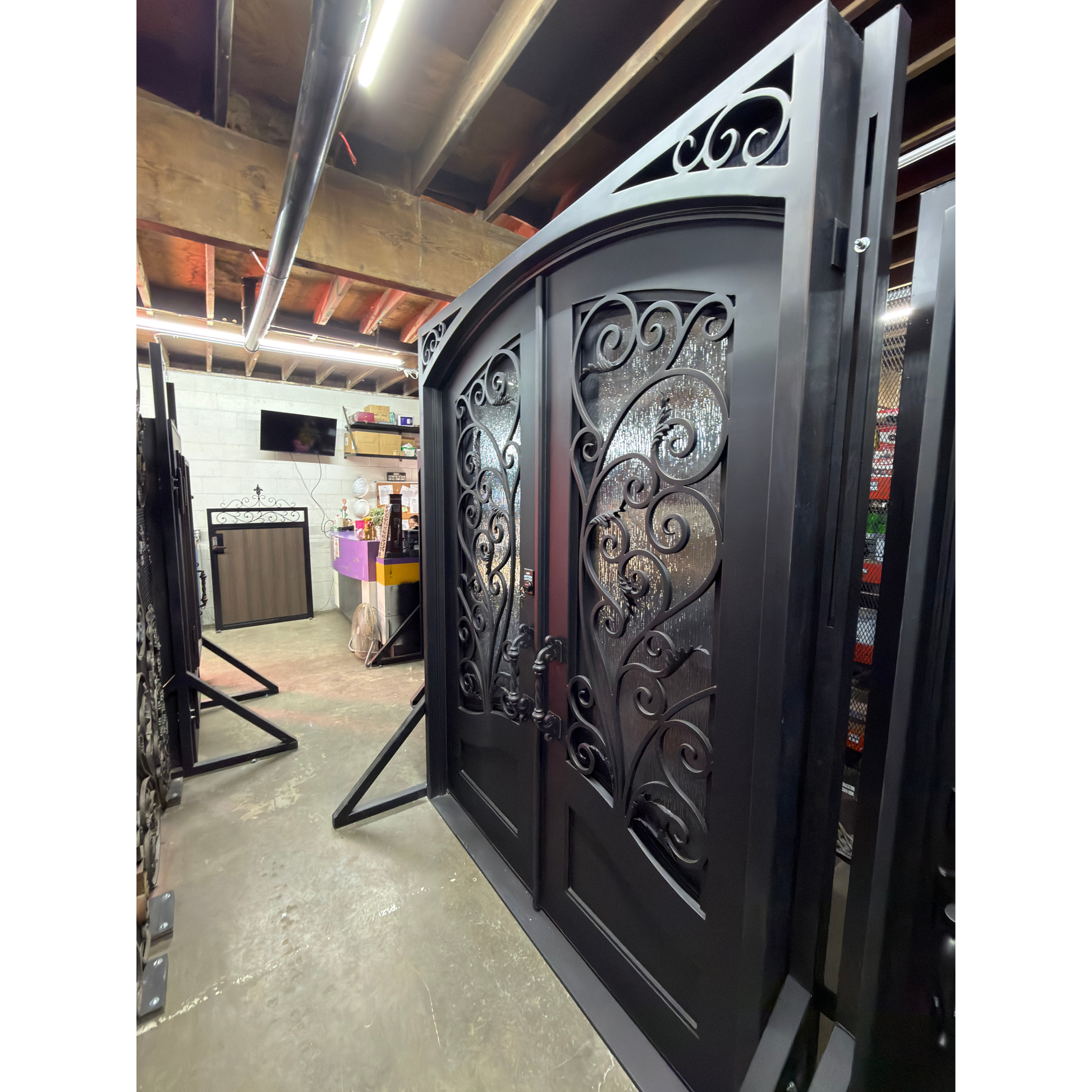 Decorative metal gate in a workshop setting