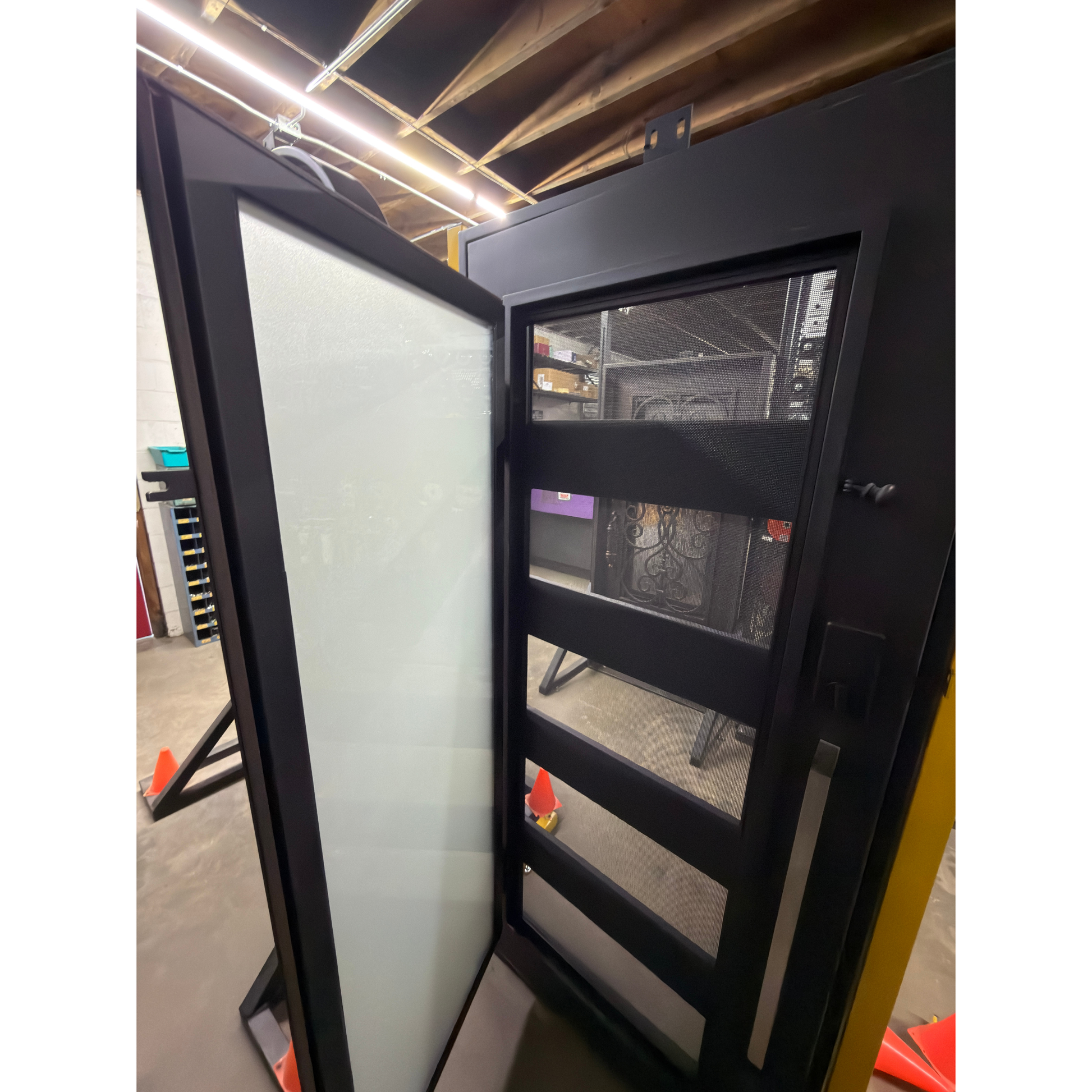 Glass door with frosted panels in a warehouse setting